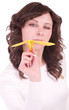 Beautiful young woman with paper airplane