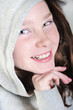 Photo: Happy girl in hoodie Happy girl in hoodie
