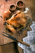 Roasted chicken on old wooden background Roasted chicken on old wooden background