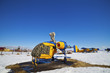 helicopter stationed in winter on a snow covered field helicopter stationed in winter on a snow covered field