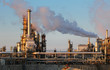 Smoke from the pipes of oil refinery