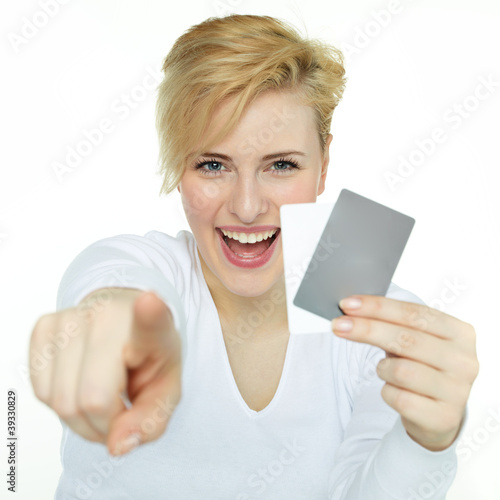 Photo: Happy woman showing her cards to you with copyspace Happy woman showing her cards to you with copyspace
