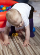 Baby taking first steps