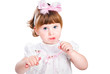 little girl painting makeup lipstick isolated on white