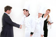 Handshake - restaurant manager and kitchen staff