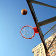 an image of playing basketball at the outside