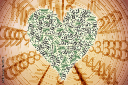 Photo: an image of heart shape with dollar bill an image of heart shape with dollar bill