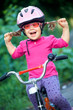 Foto: little girl cyclist little girl cyclist