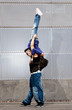 Young urban couple dancers hip hop dancing urban scene