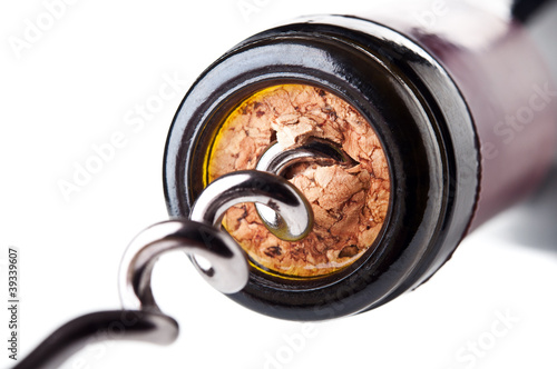 Photo: corkscrew with a bottle of wine corkscrew with a bottle of wine