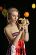 The beautiful girl with fruit
