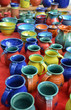 Photo: Colorful hand-made pottery for sale at outdoor market Colorful hand-made pottery for sale at outdoor market
