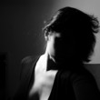 Photo: art portrait of woman with face in a shadow art portrait of woman with face in a shadow