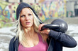 Portrait fitness woman with weight