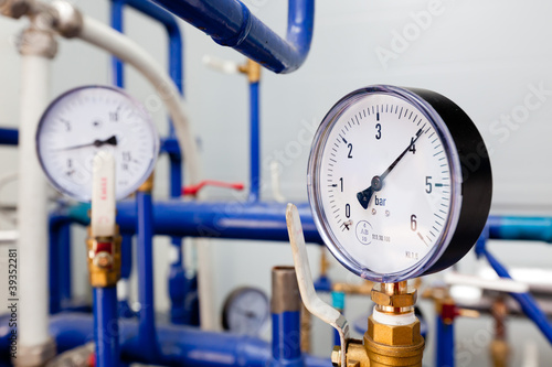 Photo: Closeup of a pressure meter on a machine Closeup of a pressure meter on a machine
