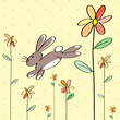 Lapin de Pâques sautant dans des fleurs