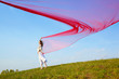 beautiful hippie girl with red fabric