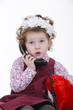 little girl with blond curly hair studio shoot