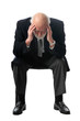 Photo: a man holds his head a man holds his head