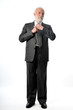 a man fixes his tie