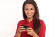 Portrait of young business woman sending fun text message