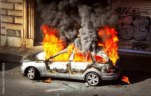 Photo: Riot - Burnt out Car Riot - Burnt out Car