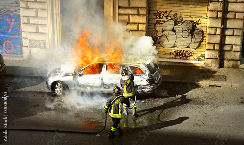 Photo: Riots - Fire fighters respond to a car fire Riots - Fire fighters respond to a car fire