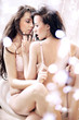 Photo of sexy brunette woman hugging