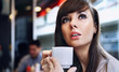 Elegant woman in a coffee break