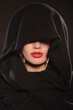 portrait of beautiful woman in cape