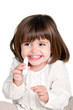 Cute litle girl holding lip balm