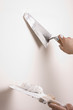 Putty Knife with Paste to Repair Wall Damage
