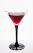 Glass with red martini on white background Glass with red martini on white background