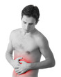 Photo: young man holding his sick stomach in pain, isolated on white ba young man holding his sick stomach in pain, isolated on white ba
