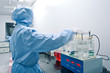 Technicians working in the pharmaceutical production line