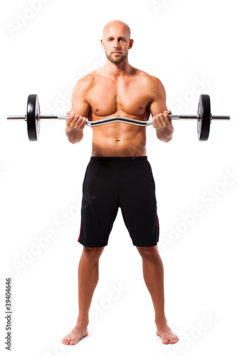 Photo: Sportler mit Langhantel beim Bizepstraining Sportler mit Langhantel beim Bizepstraining