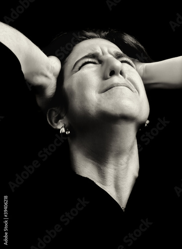 Photo: Portrait of a very sad and desperate woman Portrait of a very sad and desperate woman