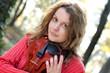 Photo: Young girl outdoor with violin Young girl outdoor with violin