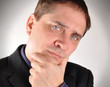 Photo: Business Man Thinking with Question Business Man Thinking with Question