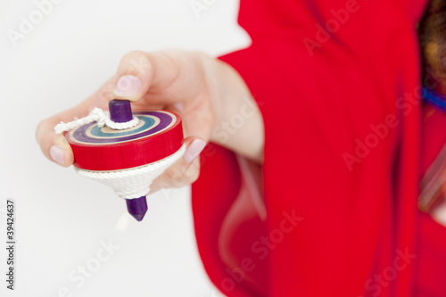 Photo: 駒を持った振袖姿の女性の手元 駒を持った振袖姿の女性の手元