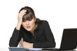 Business woman calculating at office