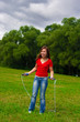 Young woman with skipping rope