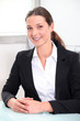 Smiling brunette businesswoman