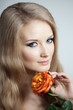 Beautiful woman with a rose