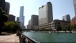Chicago boat on river between buildings