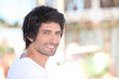 portrait of handsome black-haired man