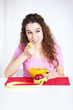 Young woman eating cereals