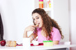 .Young woman eating toast