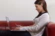 woman with laptop and credit card shopping on internet