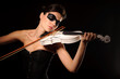 Woman play on white violin